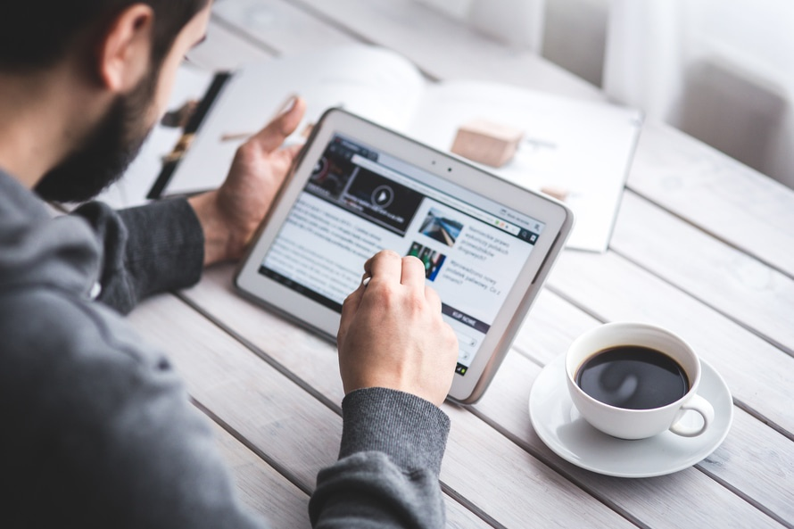 https://www.pexels.com/photo/man-using-stylus-pen-for-touching-the-digital-tablet-screen-6335/